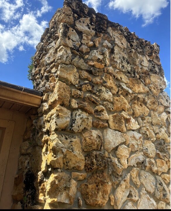 Stone chimney before cleaning in Longwood Florida
